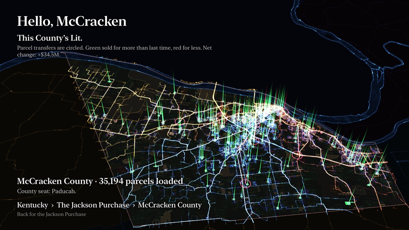 McCracken County at rest in glass on the Apple TV, beams rising from this year’s sales